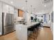 Modern kitchen with stainless steel appliances and an island at 201 New St # 2201-9, Decatur, GA 30030