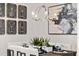 Bright dining room with chandelier and stylish wall art at 201 New St # 2201-9, Decatur, GA 30030
