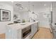 Modern kitchen with large island and stainless steel appliances at 201 New St # 2201-9, Decatur, GA 30030
