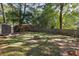 Spacious backyard with storage shed and fire pit at 906 Courtenay Ne Dr, Atlanta, GA 30306