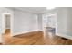 Bright dining room with hardwood floors and views to other rooms at 906 Courtenay Ne Dr, Atlanta, GA 30306