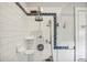 Shower with subway tile and vintage style fixtures at 906 Courtenay Ne Dr, Atlanta, GA 30306