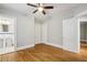Bright bedroom with hardwood floors and access to bathroom at 906 Courtenay Ne Dr, Atlanta, GA 30306