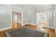 Open living area with hardwood floors and views of other rooms at 906 Courtenay Ne Dr, Atlanta, GA 30306