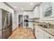 Modern kitchen with stainless steel appliances and granite countertops at 906 Courtenay Ne Dr, Atlanta, GA 30306