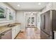 Kitchen features granite countertops, stainless steel appliances, and access to a backyard patio at 906 Courtenay Ne Dr, Atlanta, GA 30306