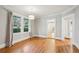 Dining room with hardwood floors and large windows at 906 Courtenay Ne Dr, Atlanta, GA 30306