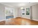 Spacious dining room with hardwood floors and access to kitchen at 906 Courtenay Ne Dr, Atlanta, GA 30306