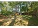 Large backyard with storage shed and fire pit at 906 Courtenay Ne Dr, Atlanta, GA 30306