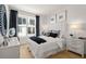 Spacious bedroom with light and airy decor, featuring a plush bed and ample closet space at 201 New St # 2205-1, Decatur, GA 30030