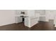 Open kitchen featuring gray cabinets, granite countertops, and an island at 536 Whitman (2010) Ln, Stockbridge, GA 30281