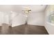 Bright living room featuring hardwood floors, stairs, and ceiling fan at 536 Whitman (2010) Ln, Stockbridge, GA 30281