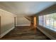 Bright living room with hardwood floors and stairs at 1904 Sandtown Sw Rd, Atlanta, GA 30311
