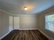Bright bedroom with hardwood floors and ample closet space at 1904 Sandtown Sw Rd, Atlanta, GA 30311