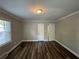 Spacious bedroom featuring hardwood floors and dual closets at 1904 Sandtown Sw Rd, Atlanta, GA 30311