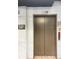 Clean and well-lit elevator lobby with tiled floors at 425 Chapel Sw St # 1206, Atlanta, GA 30313