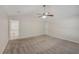 Primary bedroom with ensuite bathroom and ceiling fan at 4011 Lafayette Way, Loganville, GA 30052