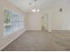 Bright dining room with tile flooring and large windows at 4011 Lafayette Way, Loganville, GA 30052