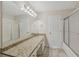Double vanity bathroom with granite countertops at 4011 Lafayette Way, Loganville, GA 30052