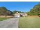 Ranch-style brick home with a two-car garage and fenced yard at 4011 Lafayette Way, Loganville, GA 30052