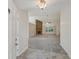 Bright entryway with tile flooring and view of living room at 4011 Lafayette Way, Loganville, GA 30052