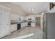 Updated kitchen with stainless steel appliances and granite countertops at 4011 Lafayette Way, Loganville, GA 30052