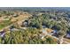Aerial view of a residential area with homes and open space at 4011 Lafayette Way, Loganville, GA 30052