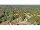 Aerial view of homes situated in a tree-lined community at 4011 Lafayette Way, Loganville, GA 30052