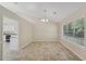 Dining area with tile flooring and a view to the kitchen at 4011 Lafayette Way, Loganville, GA 30052