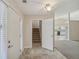 Inviting entryway with tile flooring and view of staircase and kitchen at 4011 Lafayette Way, Loganville, GA 30052