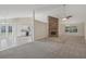 Open floor plan connecting living room, kitchen, and dining areas at 4011 Lafayette Way, Loganville, GA 30052