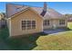 House with large backyard, patio, and grassy area at 4011 Lafayette Way, Loganville, GA 30052