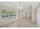 Dining area with tile flooring and a view to the kitchen at 4011 Lafayette Way, Loganville, GA 30052