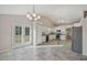Open kitchen with granite counters and stainless steel appliances at 4011 Lafayette Way, Loganville, GA 30052