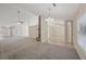 Spacious living room features high ceilings, a fireplace, and neutral carpeting at 4011 Lafayette Way, Loganville, GA 30052