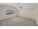 Spacious bedroom with ceiling fan and large window at 4011 Lafayette Way, Loganville, GA 30052