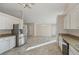 Spacious kitchen with stainless steel appliances and granite countertops at 4011 Lafayette Way, Loganville, GA 30052