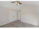 Bedroom with double closets and ceiling fan at 4011 Lafayette Way, Loganville, GA 30052