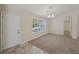 Dining room with tile floor and access to the kitchen at 4011 Lafayette Way, Loganville, GA 30052