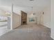 Spacious living room with high ceilings, fireplace and carpet at 4011 Lafayette Way, Loganville, GA 30052