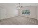 Bright bedroom featuring a ceiling fan and ample space at 4011 Lafayette Way, Loganville, GA 30052