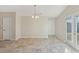 Bright dining room with tile flooring and access to backyard at 4011 Lafayette Way, Loganville, GA 30052