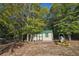 Spacious backyard with shed and lawn mower at 4011 Lafayette Way, Loganville, GA 30052