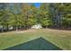 Large backyard with shed and green space at 4011 Lafayette Way, Loganville, GA 30052