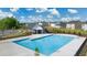 Community swimming pool with adjacent clubhouse at 619 Whitman (2200) Ln, Stockbridge, GA 30281