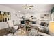 Spacious living area showcasing hardwood floors and an open floor plan with views into the kitchen at 619 Whitman (2200) Ln, Stockbridge, GA 30281