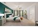 Spacious main bedroom with carpeted floors, and large windows at 619 Whitman (2200) Ln, Stockbridge, GA 30281