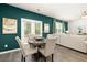 Casual dining area with table and chairs, and access to the backyard at 619 Whitman (2200) Ln, Stockbridge, GA 30281