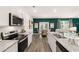 Kitchen with stainless steel appliances and granite countertops at 619 Whitman (2200) Ln, Stockbridge, GA 30281