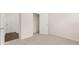 Simple bedroom with neutral carpeting and a closet at 619 Whitman (2200) Ln, Stockbridge, GA 30281